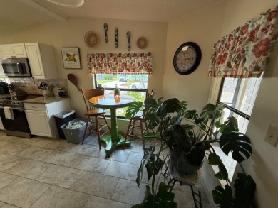 This well-cared for Palm Harbor home is being sold fully on Del Tura Golf and Country Club in Florida - for sale on GolfHomes.com, golf home, golf lot