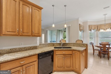 Step into a world of elegance and comfort with this timeless on Laurel Island Links in Georgia - for sale on GolfHomes.com, golf home, golf lot