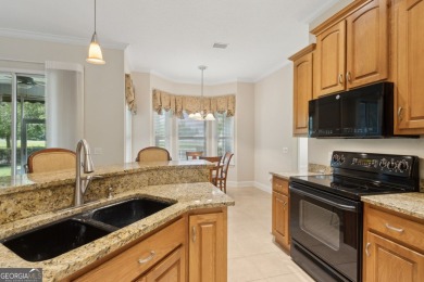 Step into a world of elegance and comfort with this timeless on Laurel Island Links in Georgia - for sale on GolfHomes.com, golf home, golf lot
