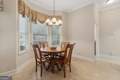 Step into a world of elegance and comfort with this timeless on Laurel Island Links in Georgia - for sale on GolfHomes.com, golf home, golf lot