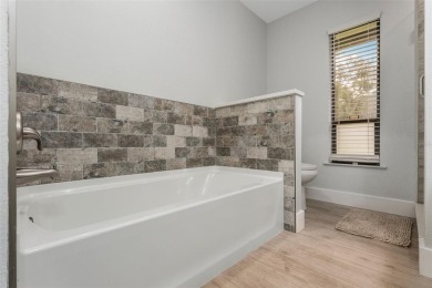 Located in the desirable Golf and Country Club community of on Tuscawilla Country Club in Florida - for sale on GolfHomes.com, golf home, golf lot