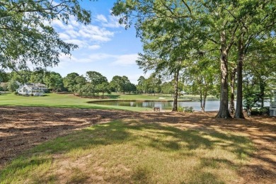 BEST VIEW GREAT WATERS MARINE COTTAGE SOLD on Great Waters Course At Reynolds Plantation in Georgia - for sale on GolfHomes.com, golf home, golf lot