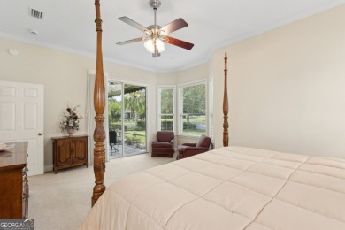 Step into a world of elegance and comfort with this timeless on Laurel Island Links in Georgia - for sale on GolfHomes.com, golf home, golf lot