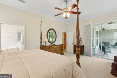 Step into a world of elegance and comfort with this timeless on Laurel Island Links in Georgia - for sale on GolfHomes.com, golf home, golf lot