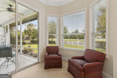Step into a world of elegance and comfort with this timeless on Laurel Island Links in Georgia - for sale on GolfHomes.com, golf home, golf lot