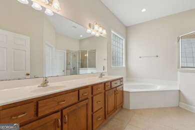 Step into a world of elegance and comfort with this timeless on Laurel Island Links in Georgia - for sale on GolfHomes.com, golf home, golf lot