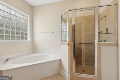 Step into a world of elegance and comfort with this timeless on Laurel Island Links in Georgia - for sale on GolfHomes.com, golf home, golf lot