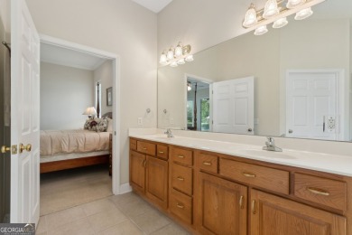 Step into a world of elegance and comfort with this timeless on Laurel Island Links in Georgia - for sale on GolfHomes.com, golf home, golf lot