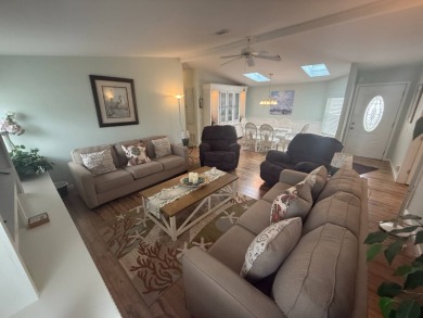 This beautiful Palm Harbor stucco is ready for new owners to on Del Tura Golf and Country Club in Florida - for sale on GolfHomes.com, golf home, golf lot