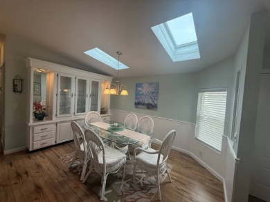 This beautiful Palm Harbor stucco is ready for new owners to on Del Tura Golf and Country Club in Florida - for sale on GolfHomes.com, golf home, golf lot
