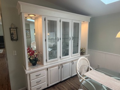 This beautiful Palm Harbor stucco is ready for new owners to on Del Tura Golf and Country Club in Florida - for sale on GolfHomes.com, golf home, golf lot