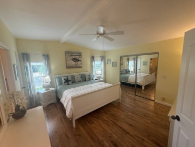 This beautiful Palm Harbor stucco is ready for new owners to on Del Tura Golf and Country Club in Florida - for sale on GolfHomes.com, golf home, golf lot