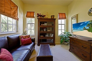 Experience refined coach home living in this beautifully on West Bay Beach and Golf Club in Florida - for sale on GolfHomes.com, golf home, golf lot