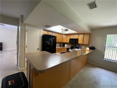 Welcome to this beautifully maintained 3-bedroom, 2-bathroom on Sugarmill Woods Golf and Country Club in Florida - for sale on GolfHomes.com, golf home, golf lot