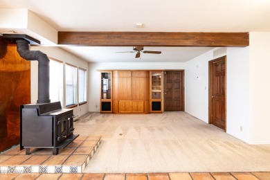 Discover this custom mountain home in Flagstaff's Continental on Continental Country Club in Arizona - for sale on GolfHomes.com, golf home, golf lot