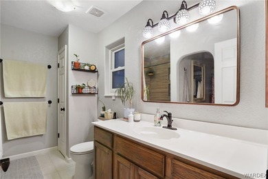 Welcome to 2411 E. Arapaho Rd! A private retreat in the heart of on Los Lagos Golf Club in Arizona - for sale on GolfHomes.com, golf home, golf lot