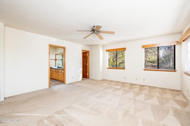 Discover this custom mountain home in Flagstaff's Continental on Continental Country Club in Arizona - for sale on GolfHomes.com, golf home, golf lot