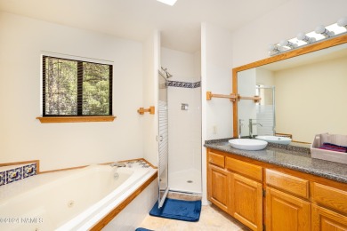 Discover this custom mountain home in Flagstaff's Continental on Continental Country Club in Arizona - for sale on GolfHomes.com, golf home, golf lot