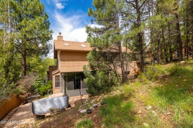 Discover this custom mountain home in Flagstaff's Continental on Continental Country Club in Arizona - for sale on GolfHomes.com, golf home, golf lot