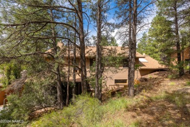 Discover this custom mountain home in Flagstaff's Continental on Continental Country Club in Arizona - for sale on GolfHomes.com, golf home, golf lot