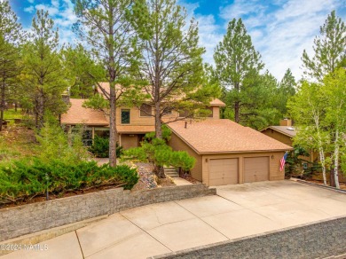 Discover this custom mountain home in Flagstaff's Continental on Continental Country Club in Arizona - for sale on GolfHomes.com, golf home, golf lot