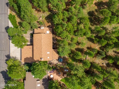 Discover this custom mountain home in Flagstaff's Continental on Continental Country Club in Arizona - for sale on GolfHomes.com, golf home, golf lot