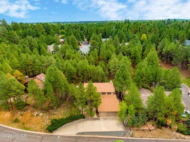 Discover this custom mountain home in Flagstaff's Continental on Continental Country Club in Arizona - for sale on GolfHomes.com, golf home, golf lot