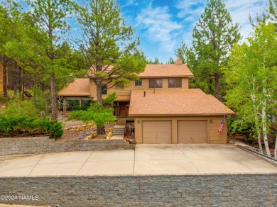 Discover this custom mountain home in Flagstaff's Continental on Continental Country Club in Arizona - for sale on GolfHomes.com, golf home, golf lot