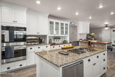 Absolutely stunning turn-key home in Silver Oak! This 5-bedroom on Silver Oak Golf Course in Nevada - for sale on GolfHomes.com, golf home, golf lot