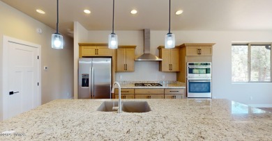 New custom home in the Torreon-Lakes community, built by Dean on Torreon Golf Club in Arizona - for sale on GolfHomes.com, golf home, golf lot