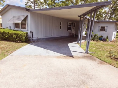 Enjoy your morning coffee or evening libation from the comfort on Rolling Greens Executive Golf Community in Florida - for sale on GolfHomes.com, golf home, golf lot