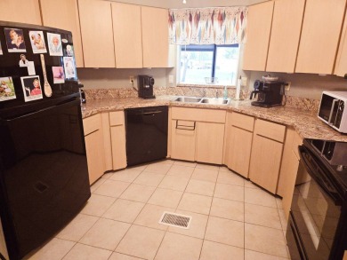 Enjoy your morning coffee or evening libation from the comfort on Rolling Greens Executive Golf Community in Florida - for sale on GolfHomes.com, golf home, golf lot