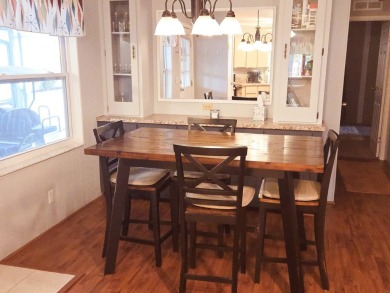 Enjoy your morning coffee or evening libation from the comfort on Rolling Greens Executive Golf Community in Florida - for sale on GolfHomes.com, golf home, golf lot