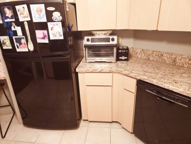 Enjoy your morning coffee or evening libation from the comfort on Rolling Greens Executive Golf Community in Florida - for sale on GolfHomes.com, golf home, golf lot