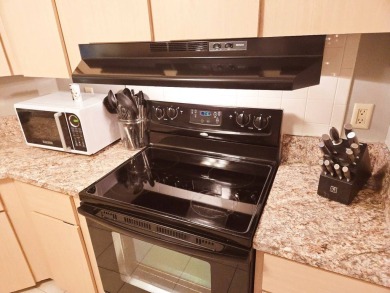 Enjoy your morning coffee or evening libation from the comfort on Rolling Greens Executive Golf Community in Florida - for sale on GolfHomes.com, golf home, golf lot