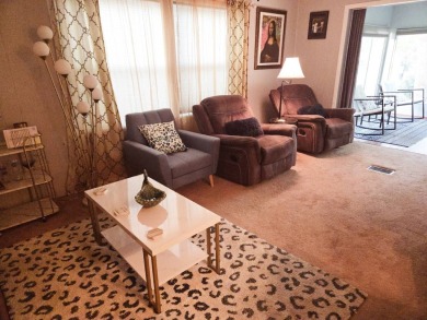 Enjoy your morning coffee or evening libation from the comfort on Rolling Greens Executive Golf Community in Florida - for sale on GolfHomes.com, golf home, golf lot
