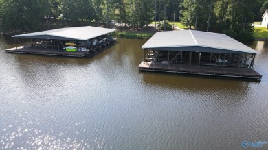 This stunning interior lake lot offers unparalleled access to on Goose Pond Colony Resort - Lake Golf Course in Alabama - for sale on GolfHomes.com, golf home, golf lot