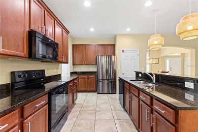 Simply stunning, this 5-bedroom, 4.5-bathroom pool home sits on on Providence Golf Club in Florida - for sale on GolfHomes.com, golf home, golf lot