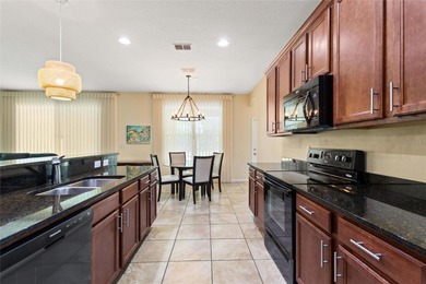 Simply stunning, this 5-bedroom, 4.5-bathroom pool home sits on on Providence Golf Club in Florida - for sale on GolfHomes.com, golf home, golf lot