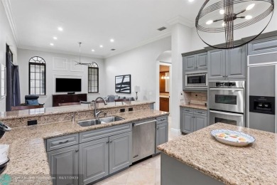 Parkland Golf and Country Club! Idyllic curb appeal with a on Parkland Golf Club in Florida - for sale on GolfHomes.com, golf home, golf lot