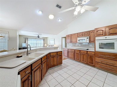 Discover this immaculate, well-maintained home in the premier on Stonecrest Golf and Club Club in Florida - for sale on GolfHomes.com, golf home, golf lot