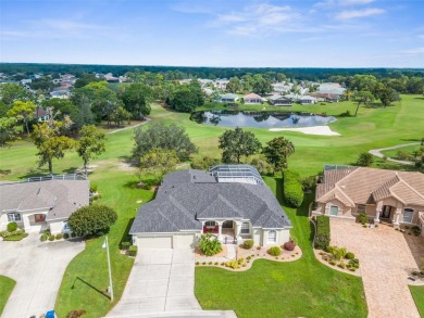 THIS HOME HAS IT ALL!! INCREDIBLE GOLF COURSE and LAKE VIEWS on Glen Lakes Country Club in Florida - for sale on GolfHomes.com, golf home, golf lot