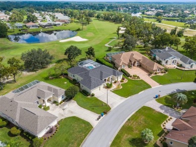 THIS HOME HAS IT ALL!! INCREDIBLE GOLF COURSE and LAKE VIEWS on Glen Lakes Country Club in Florida - for sale on GolfHomes.com, golf home, golf lot