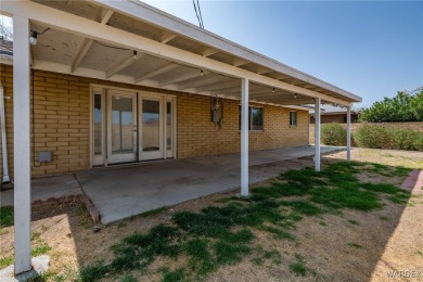 Welcome to this beautifully updated 4-bedroom, 2.5-bathroom home on Cerbat Cliffs Golf Course in Arizona - for sale on GolfHomes.com, golf home, golf lot