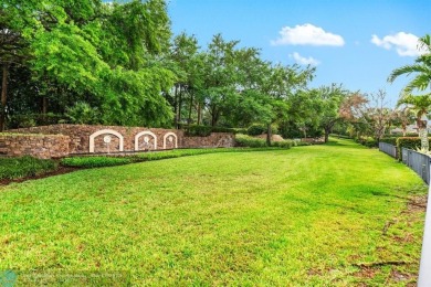 Parkland Golf and Country Club! Idyllic curb appeal with a on Parkland Golf Club in Florida - for sale on GolfHomes.com, golf home, golf lot