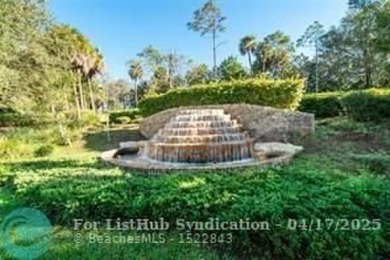 Parkland Golf and Country Club! Idyllic curb appeal with a on Parkland Golf Club in Florida - for sale on GolfHomes.com, golf home, golf lot