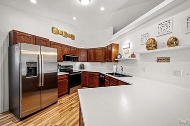 There's a calm that greets you the moment you enter this on Desert Hawk At Pueblo West in Colorado - for sale on GolfHomes.com, golf home, golf lot