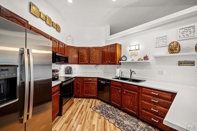 There's a calm that greets you the moment you enter this on Desert Hawk At Pueblo West in Colorado - for sale on GolfHomes.com, golf home, golf lot