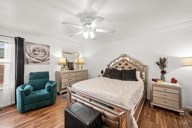 There's a calm that greets you the moment you enter this on Desert Hawk At Pueblo West in Colorado - for sale on GolfHomes.com, golf home, golf lot