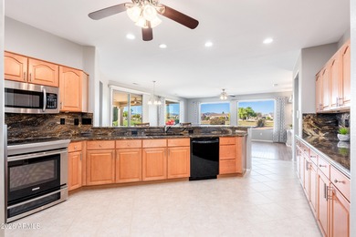 Luxury golf course living awaits you in this highly sought-after on Sun City Grand Golf Couse and Club in Arizona - for sale on GolfHomes.com, golf home, golf lot